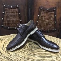 محصولات چرمی - کفش مردانه از چرم اصل شترمرغ قهوه ای رنگ مخصوص خاص پسندا ضمانت کیفیت و اصالت کالا با دوختی ظریف و زیبایی خاص- کفش مردانه